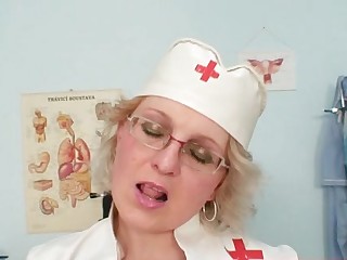 Filthy Milf in nurse uniform shows big tits