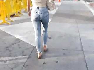 Tight little ass walking in jeans